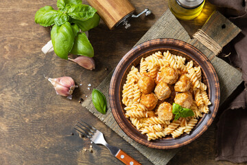 Italian  homemade kitchen. Italian fusilli pasta gluten freewith meat balls in tomato sauce and...