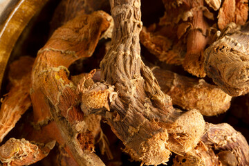 turmeric roots on bamboo plate