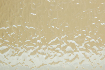 Frosted glass. Rippled glass textured background with color gradient.