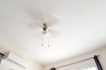 Ceiling fan working in the living room.