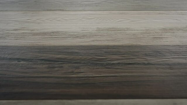 Textures and pattern of ceramic granite tiles with a surface imitating wooden boards.