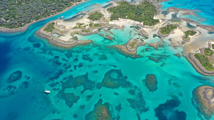 Fototapeta na wymiar Aerial drone photo of paradise volcanic island complex resembling a blue lagoon archipelago in exotic destination bay with deep turquoise sea and crystal clear water beach