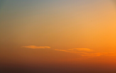 Colorful sunset background with dark and light parts in sky