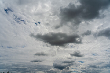 White and grey fluffy clouds in the sky