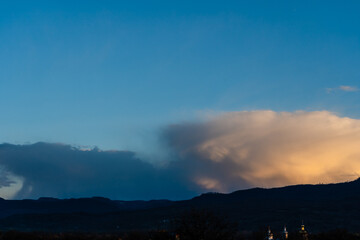 Beautiful clouds in sky over valley hills