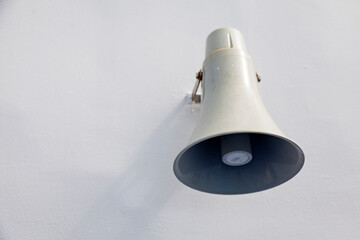 megaphone mounted on light boat wall