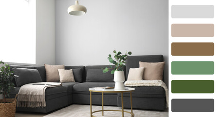 Interior of light living room with sofa. Different color patterns