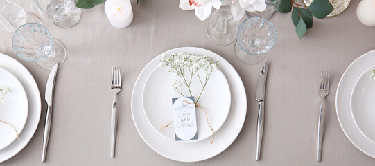 Beautiful wedding table setting with floral decor, top view