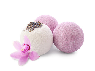 Bath bombs and orchid flower on white background