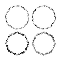 Set of 4 hand drawn spring wreaths isolated on white background, vector. Outline and silhouette frames with leaves. Doodle style.Collection of floral monogram frames.