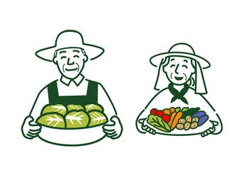 収穫した野菜を持つ夫婦