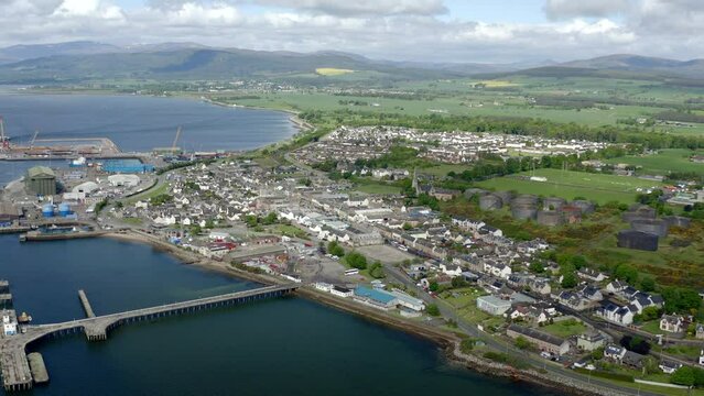 Flight above Invergordon - Scotland. City establishing shoot.
