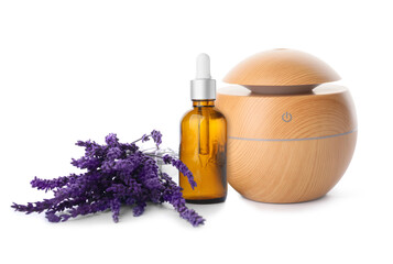 Aroma oil diffuser and lavender essential oil on white background
