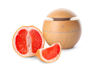 Aroma oil diffuser and grapefruit on white background
