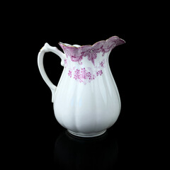 antique ceramic vase with a picturesque pattern. vintage vase with painting on black isolated background. painting.