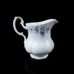 antique ceramic vase with a picturesque pattern. vintage vase with painting on black isolated background. painting.