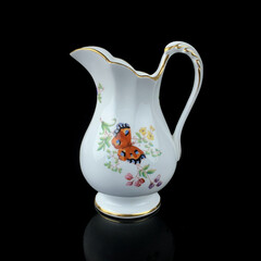 antique ceramic vase with a picturesque pattern. vintage vase with painting on black isolated background. painting.