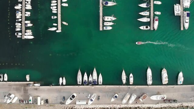 Sea travel concept. Aerial shot, above of the marina with yachts