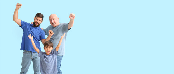 Happy man, his little son and father on light blue background with space for text