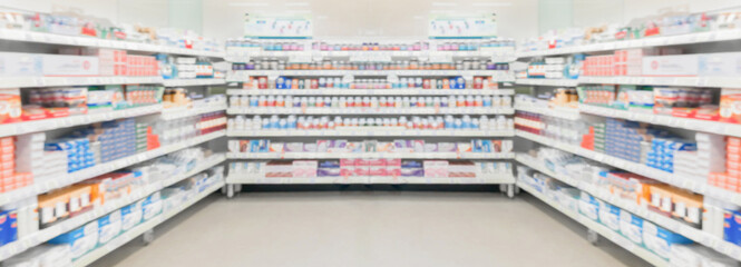 Pharmacy drugstore shelves interior blur medical background - obrazy, fototapety, plakaty