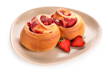 Plate with strawberry cinnamon rolls on white background