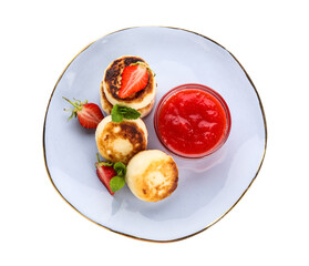 Stylish plate with cottage cheese pancakes, strawberry and mint leaves on white background