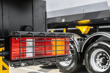 taillights and brake lights of a dump truck, tractor, bulldozer