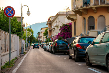 Cars parked along the street.