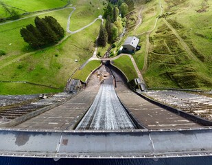 Aerial view of water flowing down a dam. Yorkshire England. 