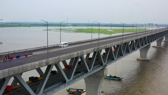 Aerial view of Padma bridge, over the Padma river by day in perspective, Shibchar, Dhaka, Bangladesh.