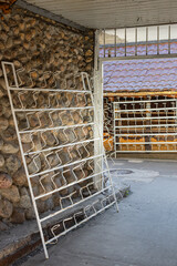 metal design hanger with holders for hats