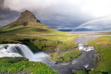 famous Kirkjufell with waterfall during summer