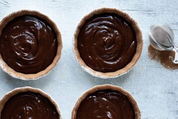 Cooking chocolate fondant, pouring into molds, process