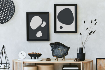 Beautiful living room interior design with mock up poster frames, mineral and personal accessories on the wooden console. Template.