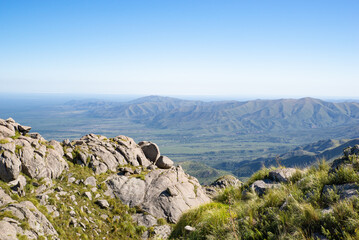 Scenic View of Green Mountains and Valley Against Skyline in Sierras de Cordoba, Argentina