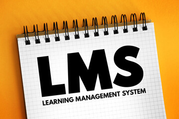 LMS - Learning Management System acronym, software application for the administration, documentation, tracking, reporting, automation, and delivery of educational courses, concept on notepad