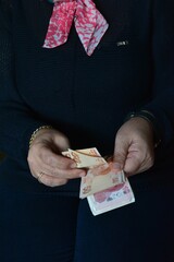 Turkish money, woman counting money, turkish money