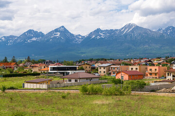 Fototapeta na wymiar Townscape of Poprad, Slovakia, with mountains in the background