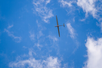 Fototapeta premium Sailplane flying high in blue sky