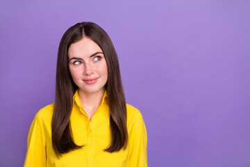 Fototapeta premium Portrait of attractive cheerful curious girl deciding copy space isolated over bright violet purple color background