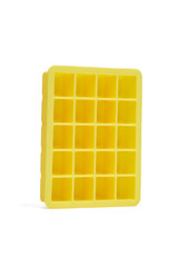Close-up shot of an empty yellow flexible rectangular silicone ice cube tray. The silicone ice cube tray is isolated on a white background. Front view.