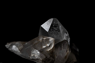 clear quartz crystals on black background