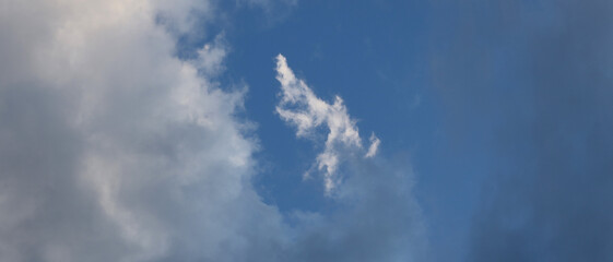 Naklejka na ściany i meble Blue sky with white clouds, weather and atmosphere.