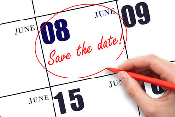 Hand drawing red line and writing the text Save the date on calendar date June 8.