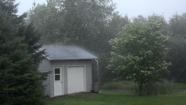 Heavy rain on garden shed. Downpour on garden shed, this video features intense rainfall turning a simple garden shed into a rainy shed.