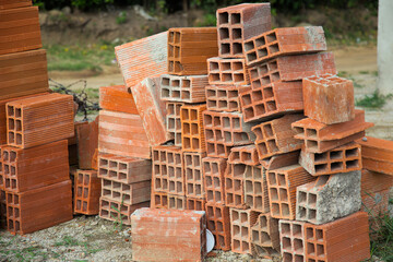 Pile of hollow bricks for constructing a building