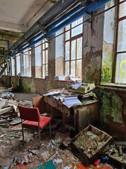 desk to an old derelict industrial plant