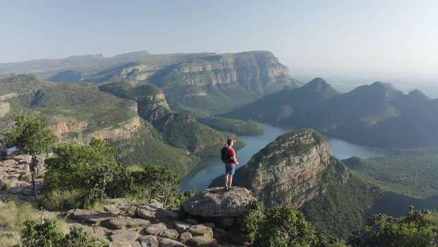 Aerial View of person watching by the peak the Blyde River Canyon Nature Reserve, Mpumalanga, South Africa.