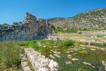 Fototapeta na wymiar The remains of the ancient city of Limyra, are situated on the Kumluca-Finike road 11 km after Kumluca, in Zengerler village, and on the mountain hillsides to the Finike plain, Antalya