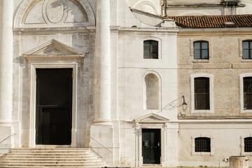 medieval stone buildings on street in Venice.